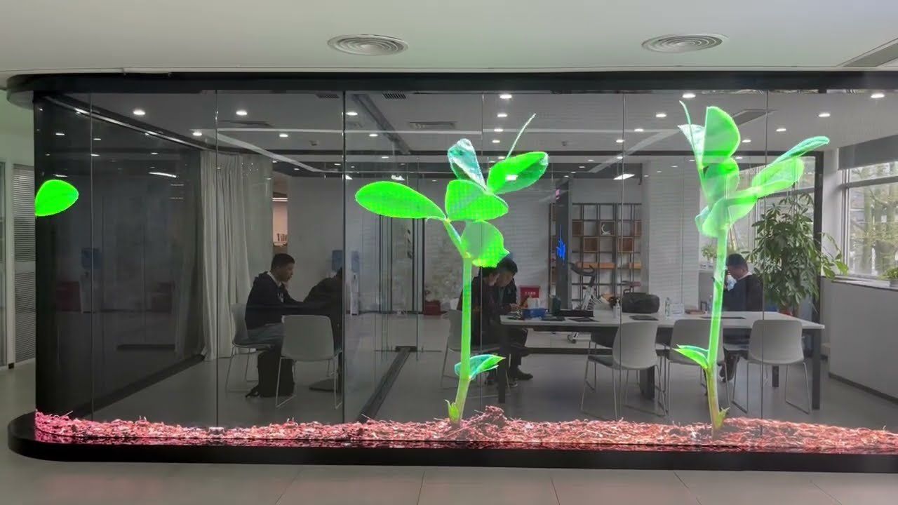 Parete vetrata con LED film trasparente che mostra un germoglio verde animato